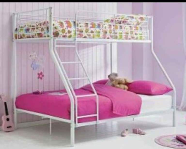 Triple bunk bed with mattresses.  Good condition and 