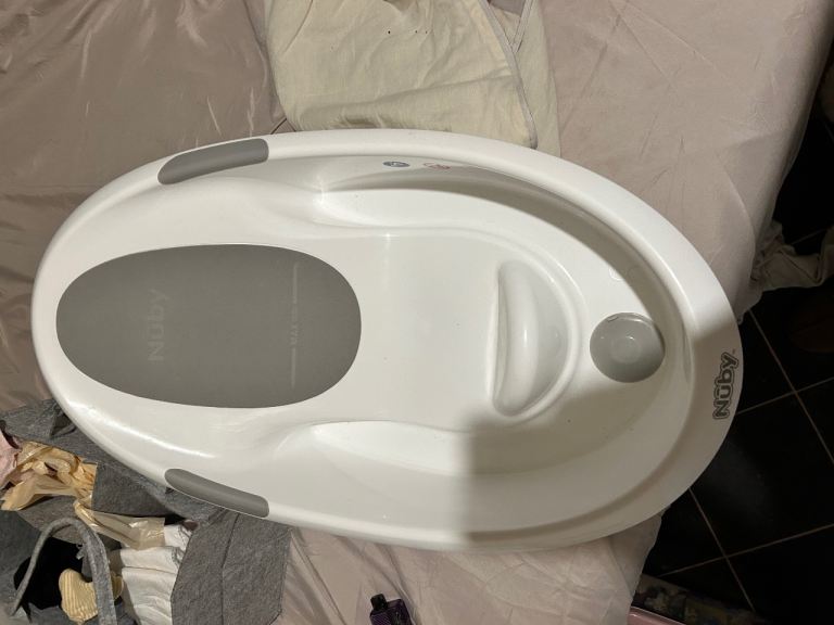 Baby bath with built in seat 