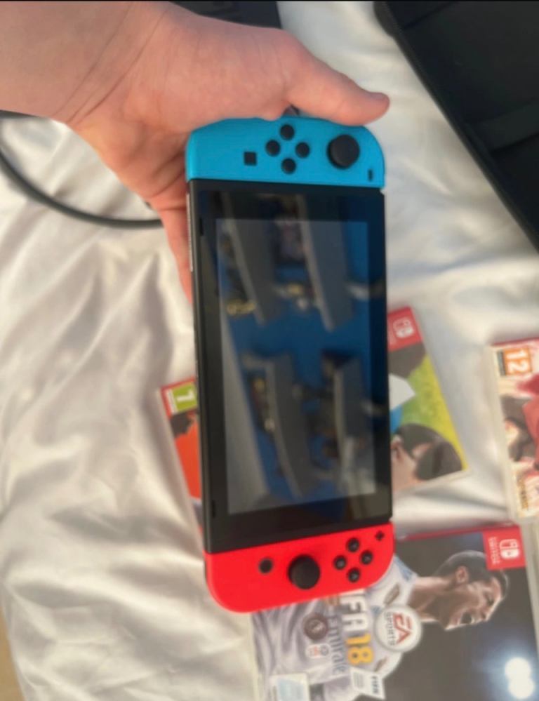 Nintendo switch plus 6 games