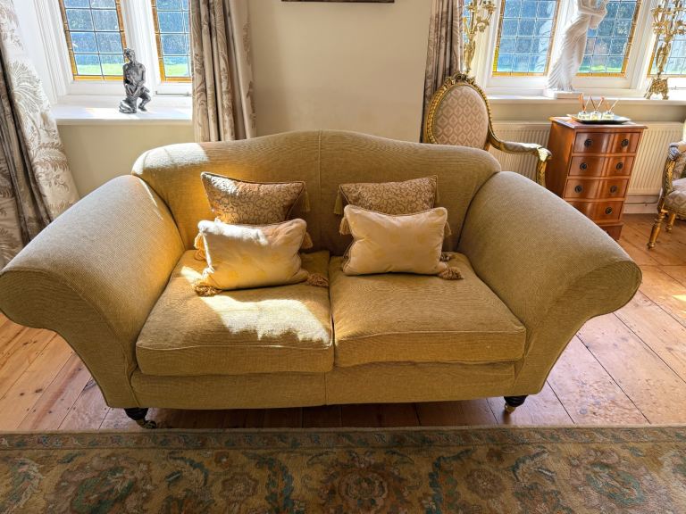 Multiyork gold mustard 2 seater sofa on brass casters 