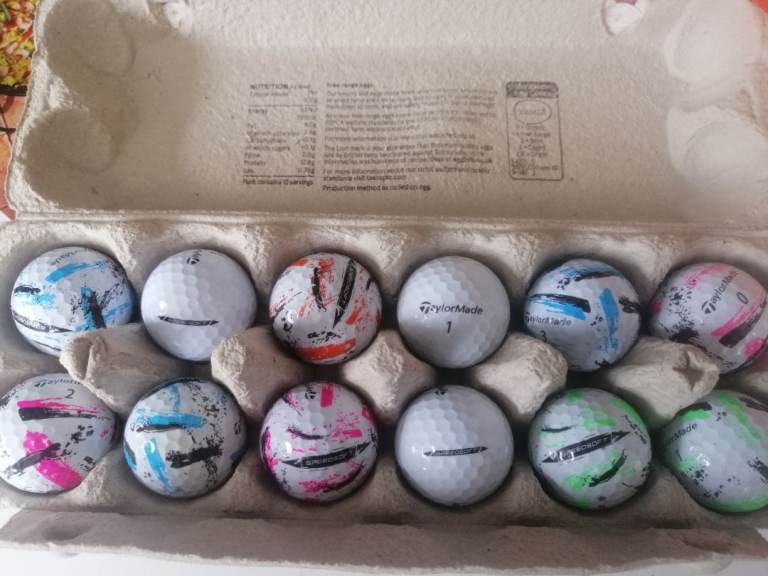 Golf balls of all makes and model from pearl to lake grade