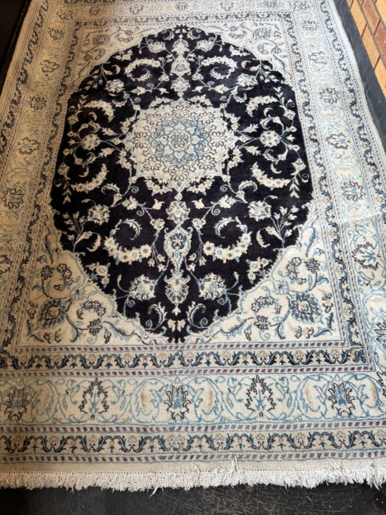 Persian handmade wool rug. 242 cm x 164 cm