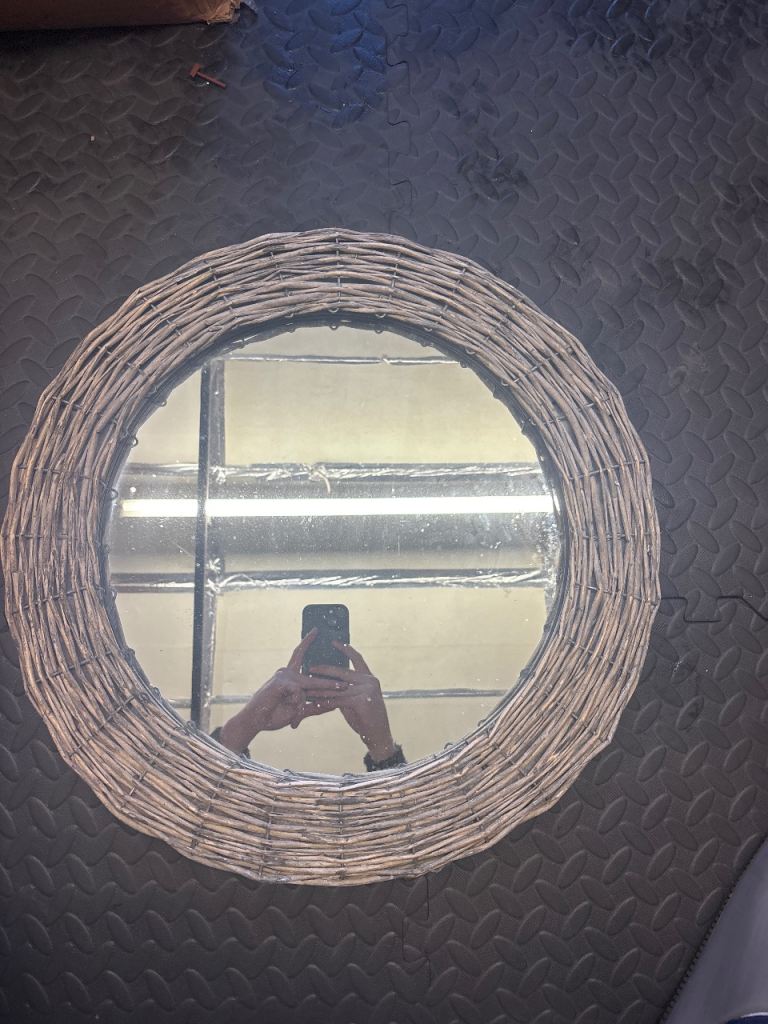 Circular wicker mirror