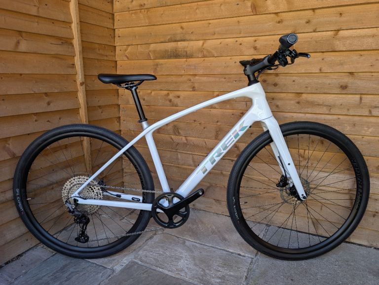 BRAND NEW TREK FX 4 Medium Carbon Fibre Hybrid bike VIEW SWANSEA/BRIDGEND