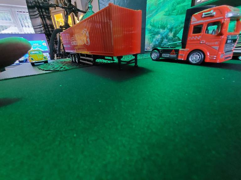 quality detailed 1/48scale 12.6 inch long 10 wheeled articulated trucks in 4 colours  new in box