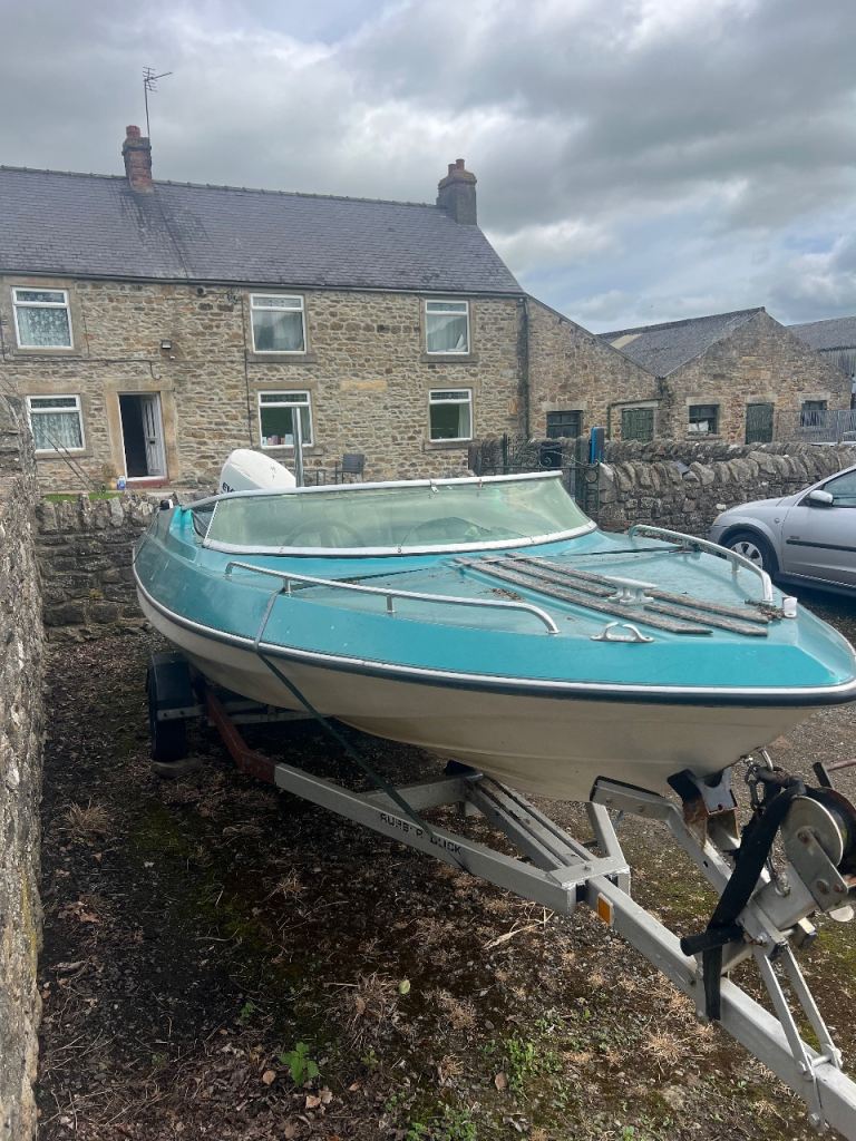 Evinrude Motor Boat and Trailer – Fair Condition