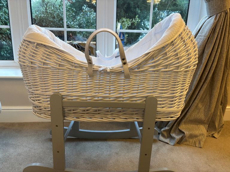 White and grey wicker Moses basket