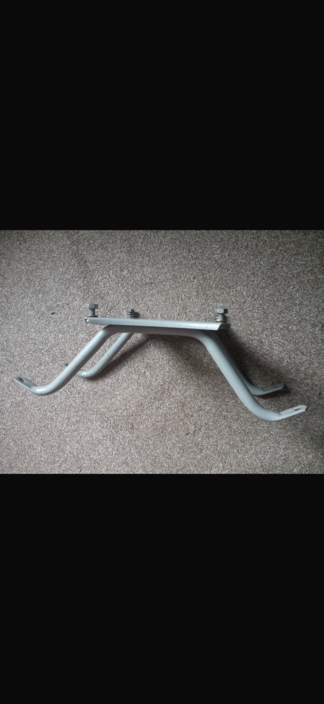 Lambretta Series 1 /2 inside legshields spare wheel holder.