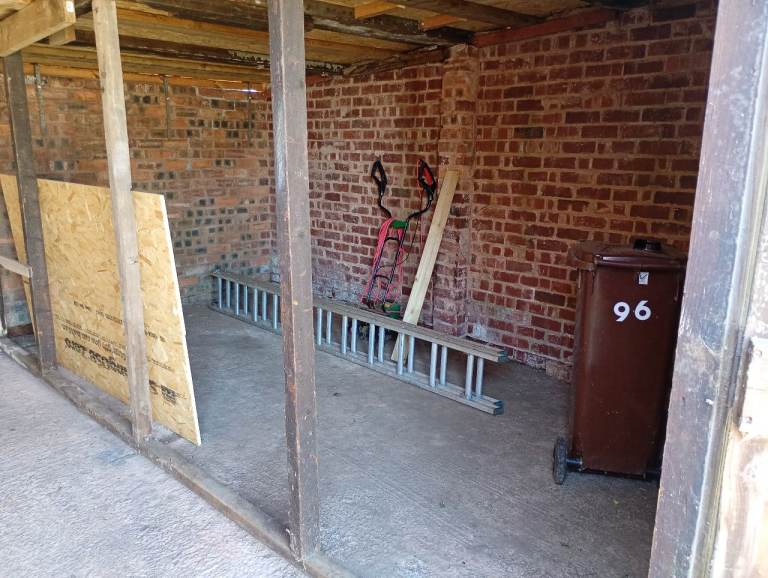 Garage, plus extra storage and offroad parking