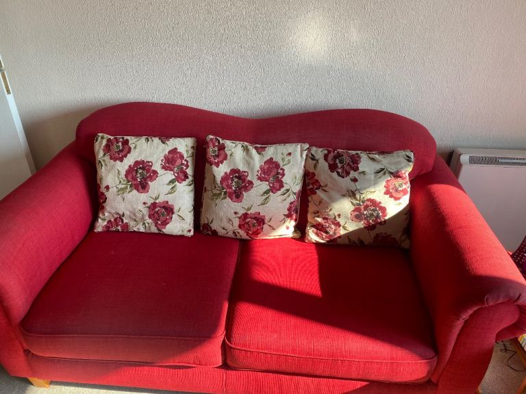 Red Sofa and chair , little bit worn on arms and chair but all fine 