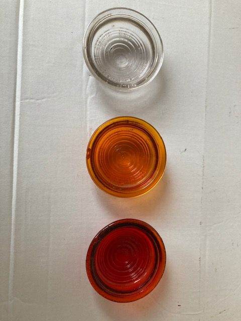 Lucas 488 spare lens set red, amber, clear. As used on many UK cars in the 1940-early 1950’s