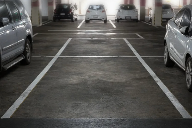 RENT NOW Gated and covered 2 PARKING SPOTS E1 