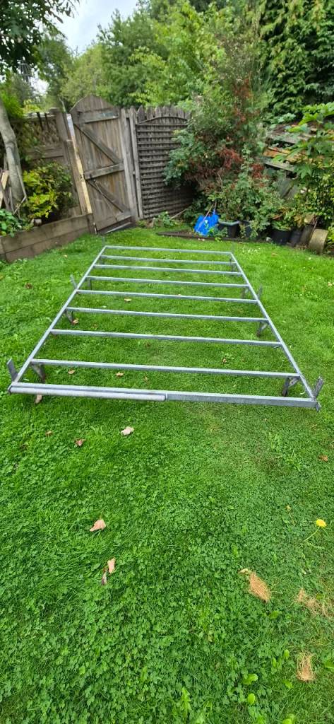 Roller roof rack fits Ford Transit van. 