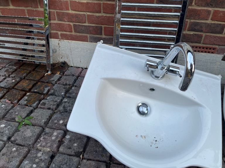 White Bathroom Basin with Modern Chrome Mixer Tap