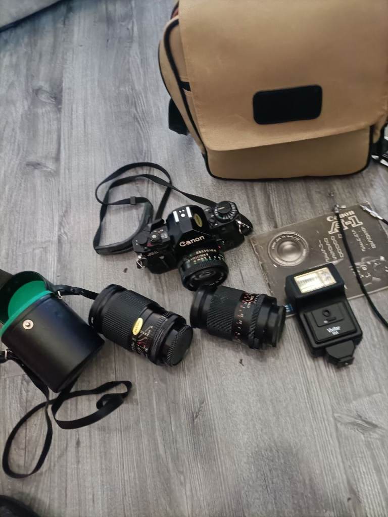 Canon AE-1 Film Camera with Lenses and Flash – Good Condition