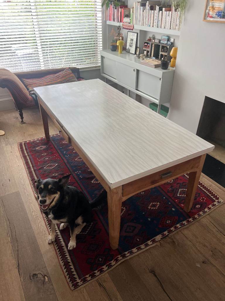 Large farmhouse table with drawers.