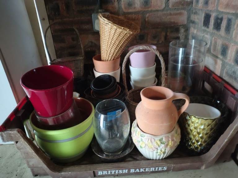 Plant pots, vases and hanging baskets.