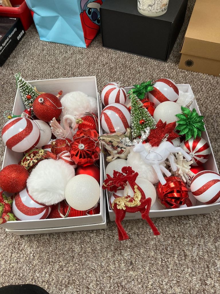 Red white gold and green Christmas tree decorations 