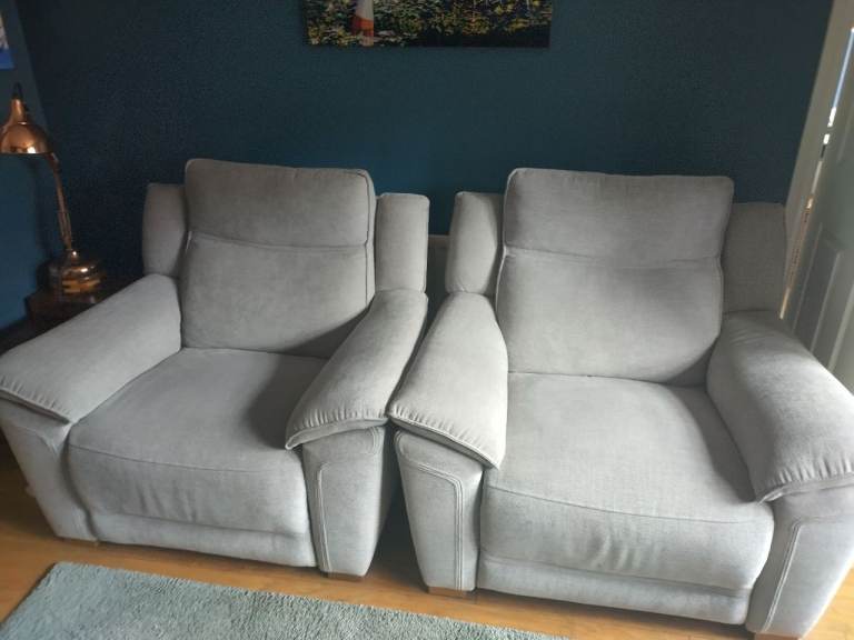 Two large luxurious armchairs