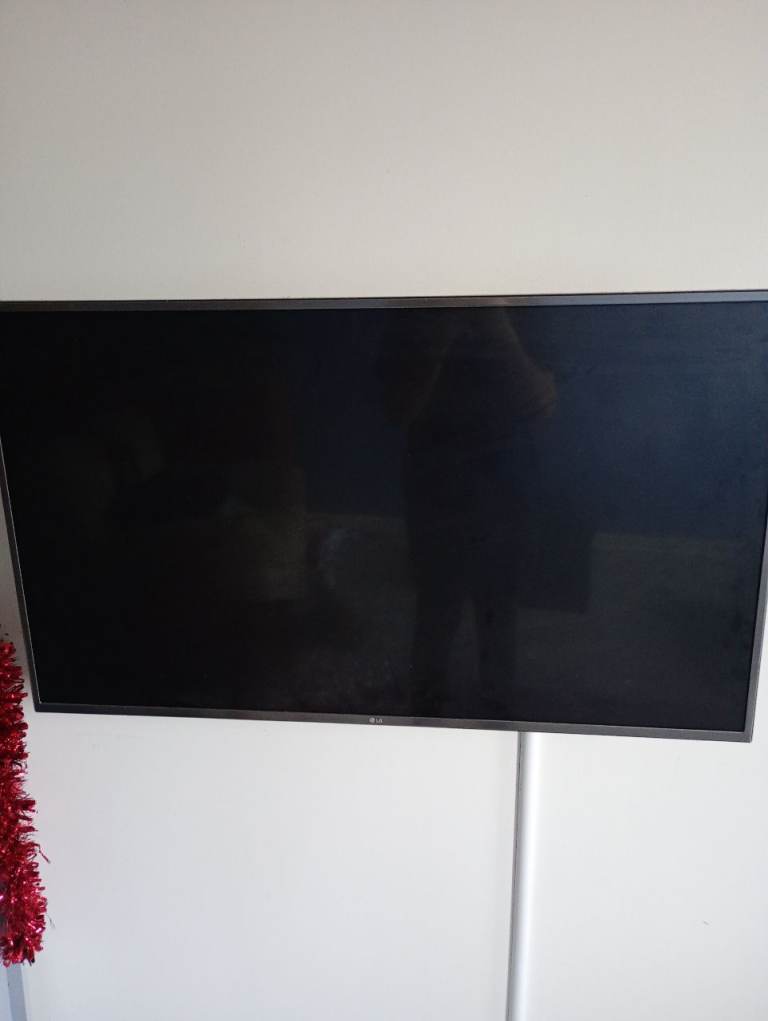 image for LG Television 49 inch with wall bracket 