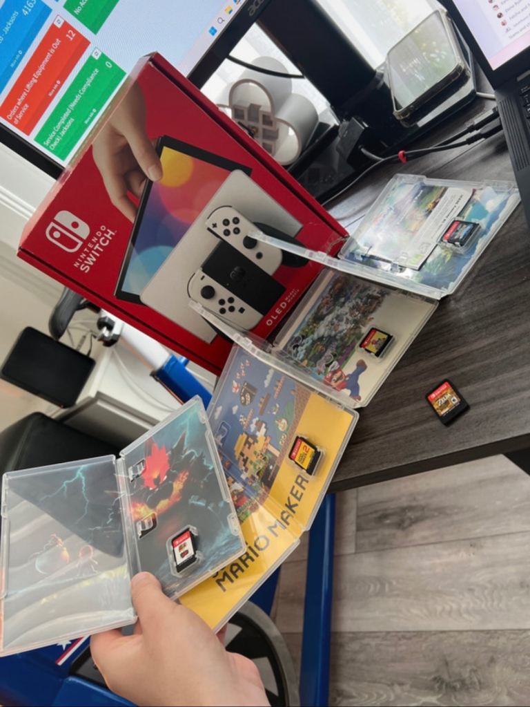 Nintendo Switch OLED with Games – As Good As New