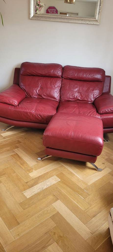 Dfs red leather sofa and stool 