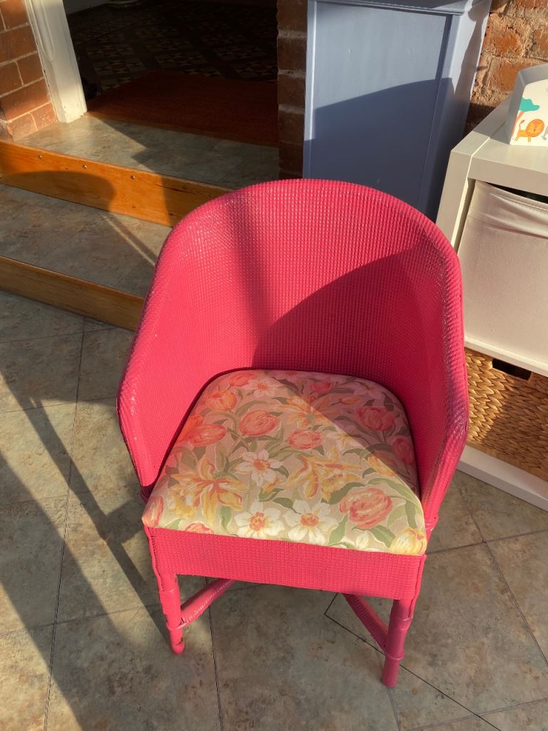Pink Rattan Chair with Floral Cushion – Good Condition