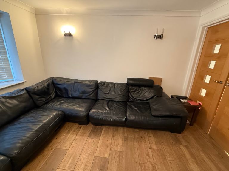 FREE! Black iItalian  leather sofa,