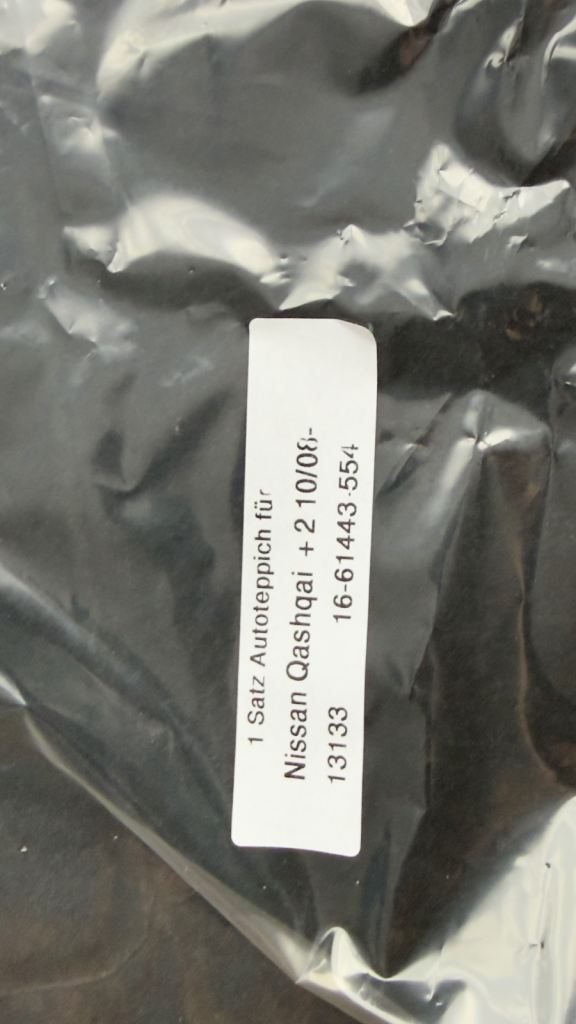 Nissan qashqai +2 carpet rugs with logo brand new