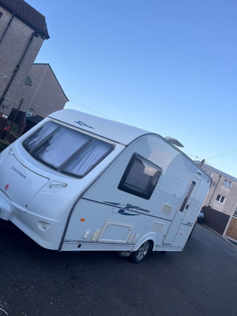 2008 coachman highlander, motor mover, awning