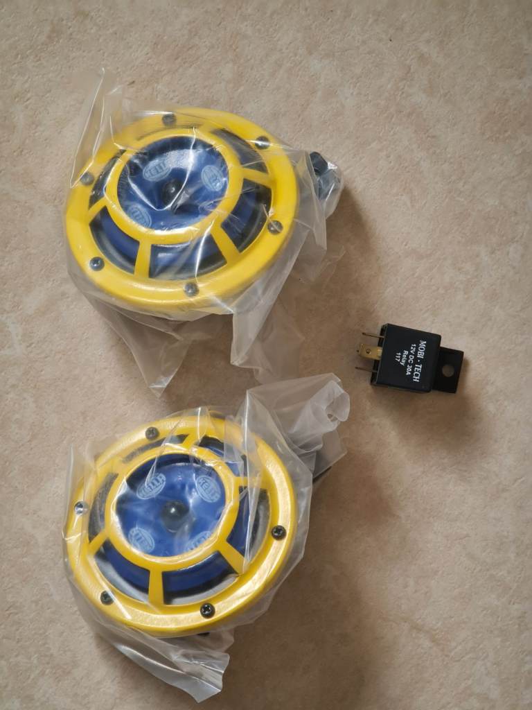 Brand new Hella horns sharp tone set 2 x 42watt 118dB