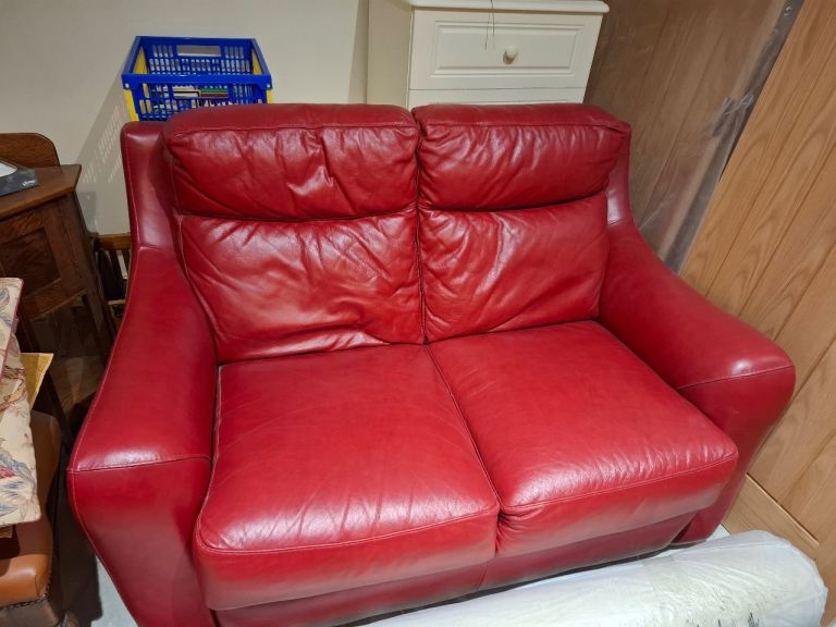 Italian design leather recliner and 2 seater sofa