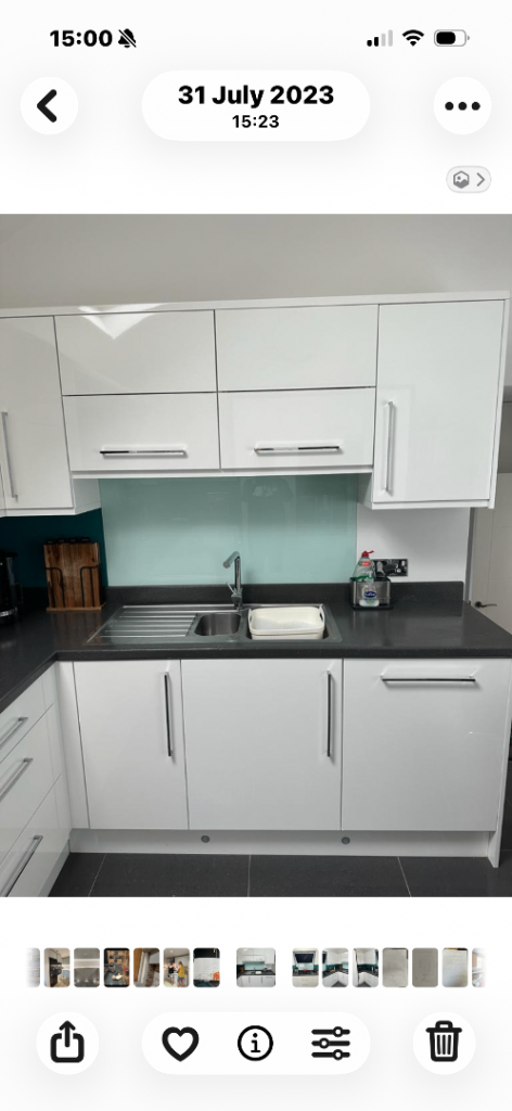 Full White Kitchen with Appliances and Worktops