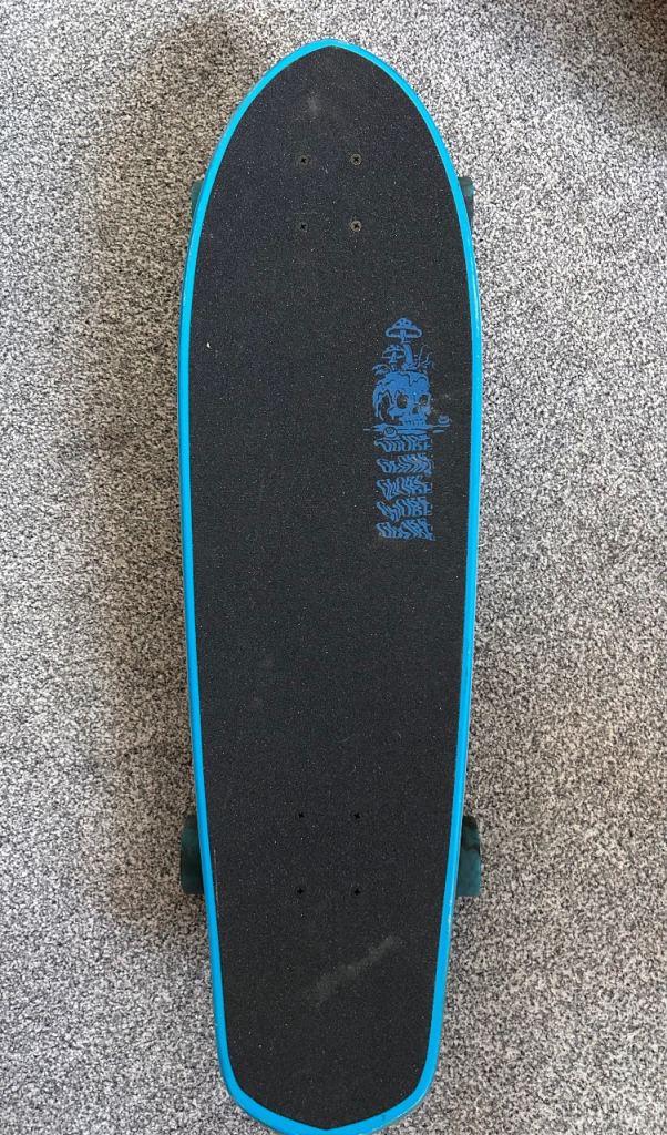 Globe Skateboard with Mushroom Graphic