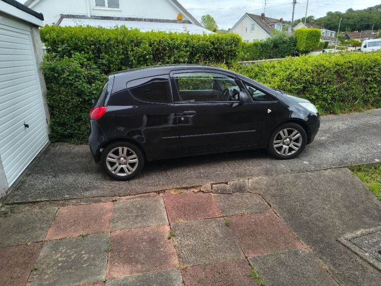Mitsubishi Colt Black Hawk 108.119 miles 