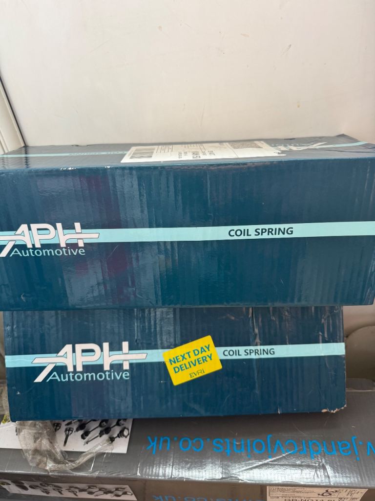 Set of rare coil springs, set of drive shafts and brake disks 