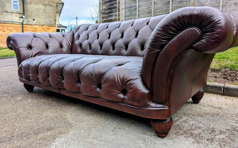 Grand oskar 4 seater chesterfield sofa with matching armchair in immaculate condition.