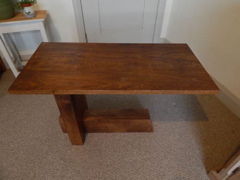 Cantilevered design display / coffee table in elm.