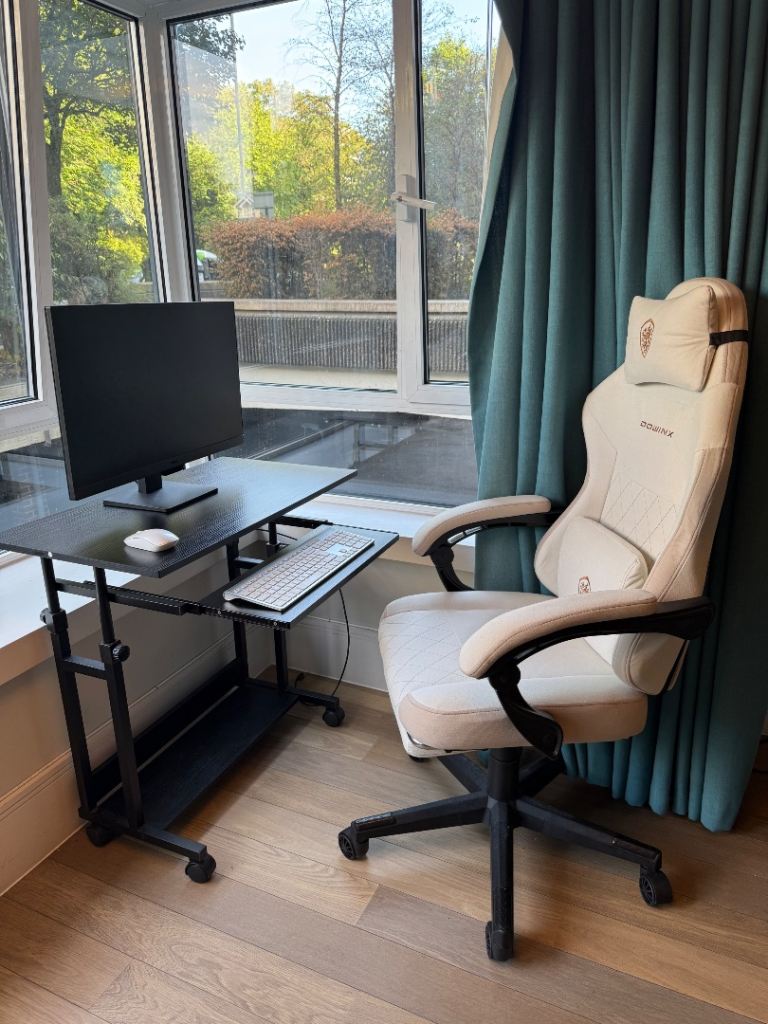 Black Adjustable Desk with Wheels and Gaming Chair