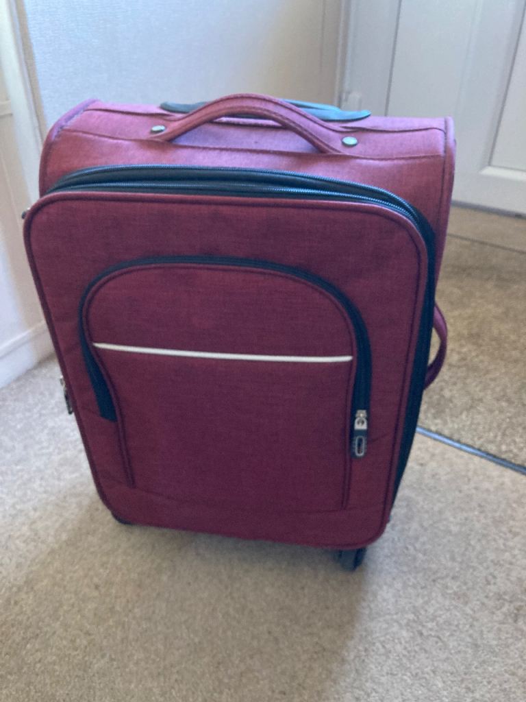 Red Fabric Suitcase with Wheels – Good Condition