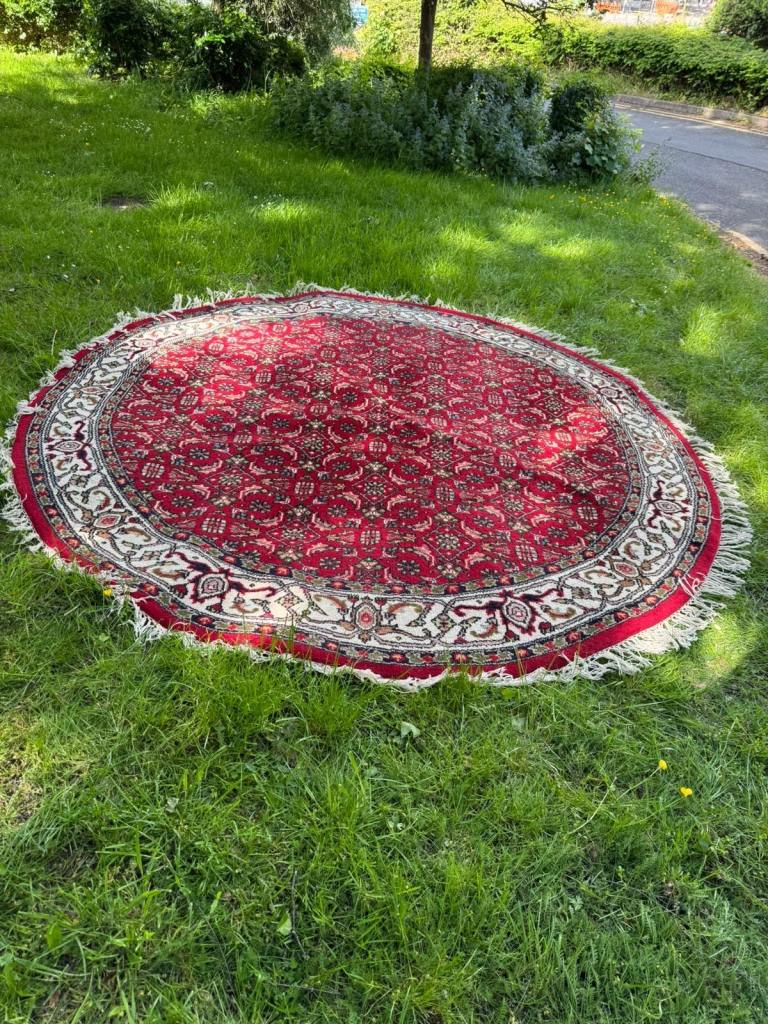 Handmade round wool rug.