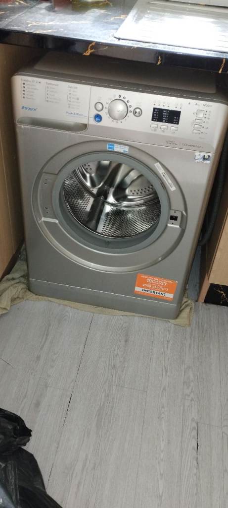 Washing machine . Door needs to be fixed back on with a bolt 