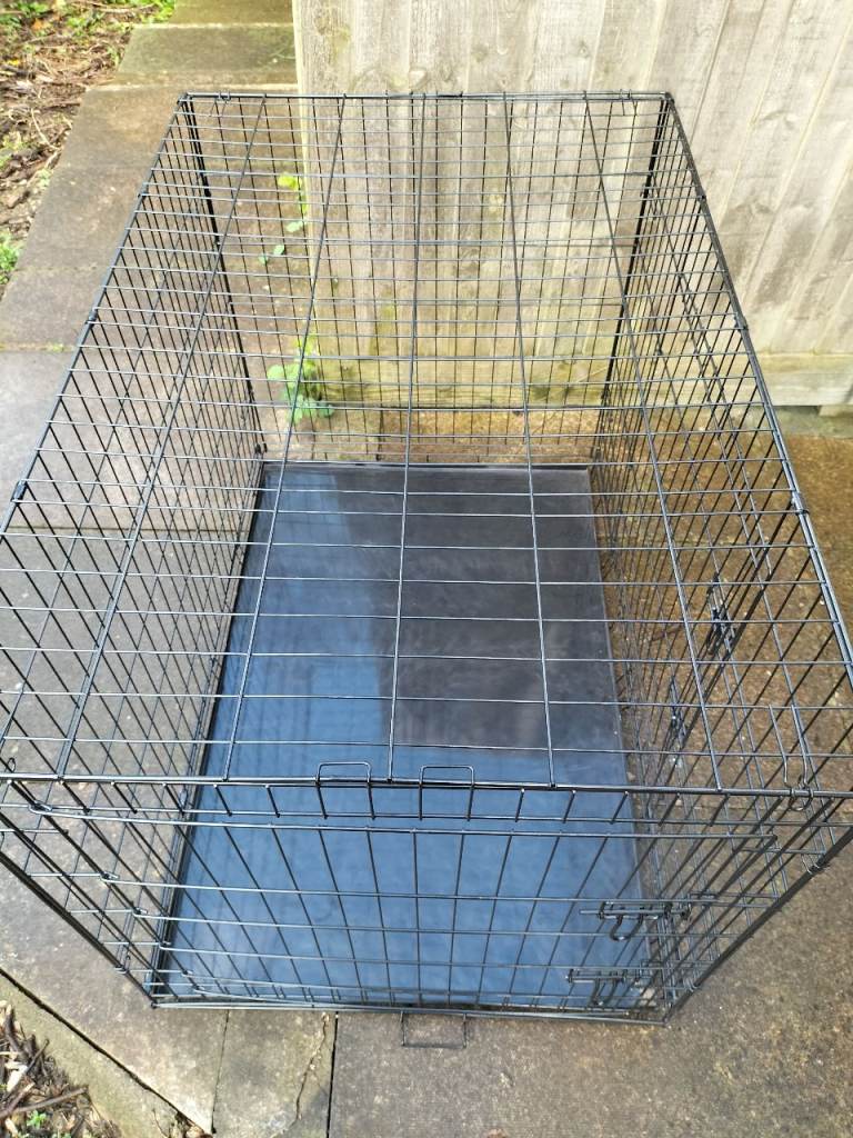 XXL dog crate used once 