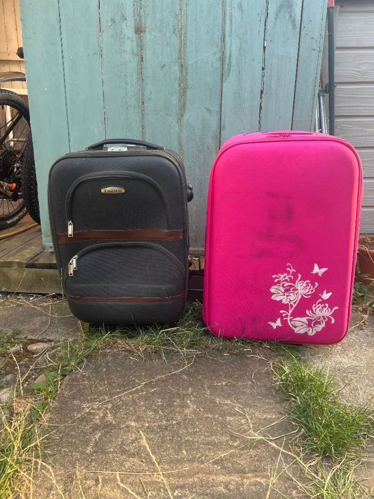 Two Travel Suitcases – Black and Pink, Good Condition