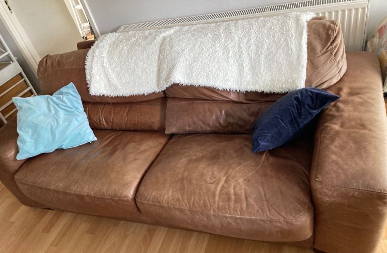 Brown leather sofa. 