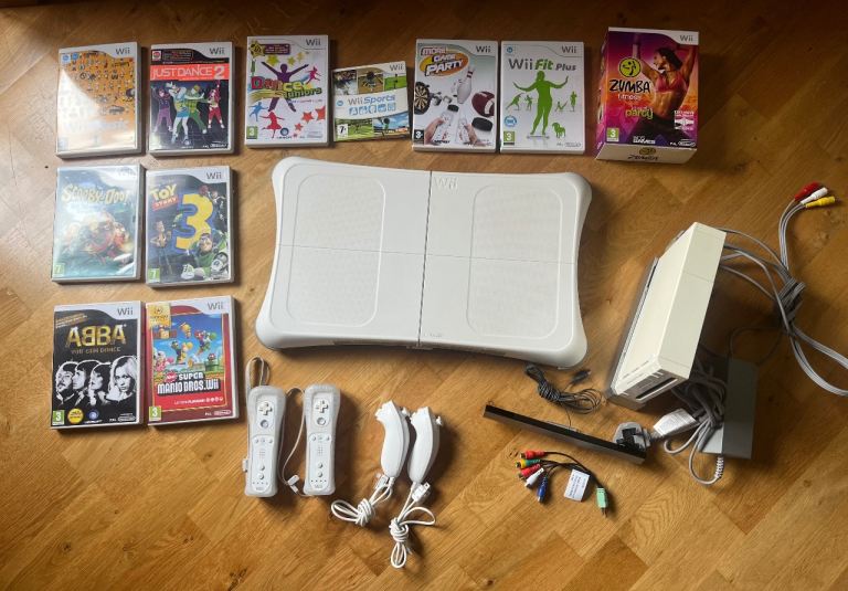 Wii console, balance board and games