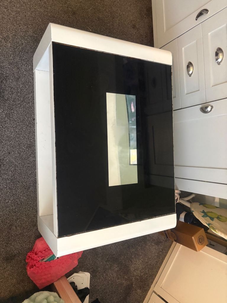 White Coffee Table with Black Glass Top – Good Condition