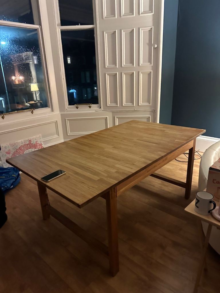 Solid Wood Extendable Dining Table – Good Used Condition