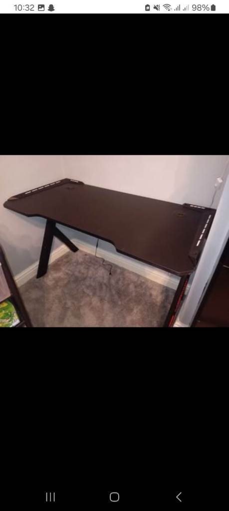 Black gaming desk with LED