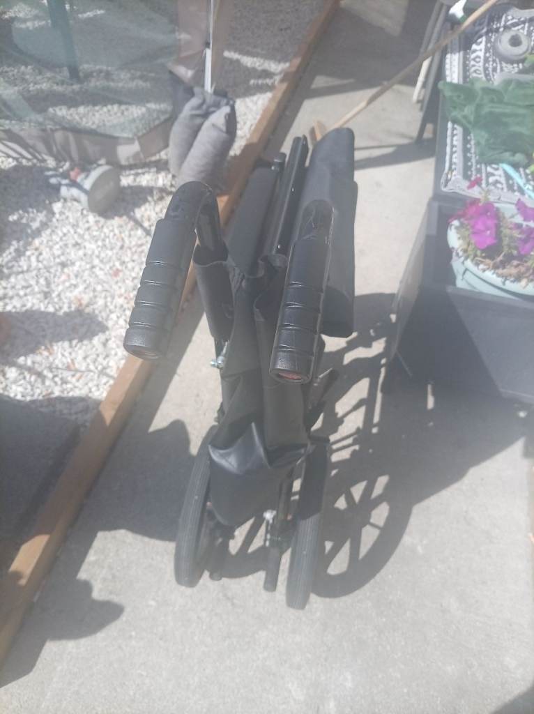 Portable folding wheelchair 